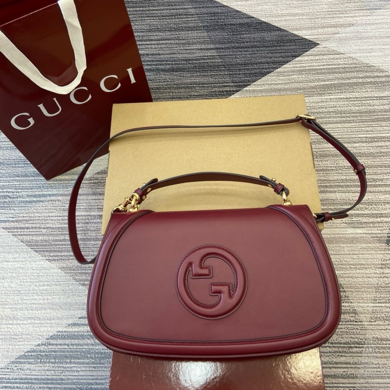 G*u*i top handle bags